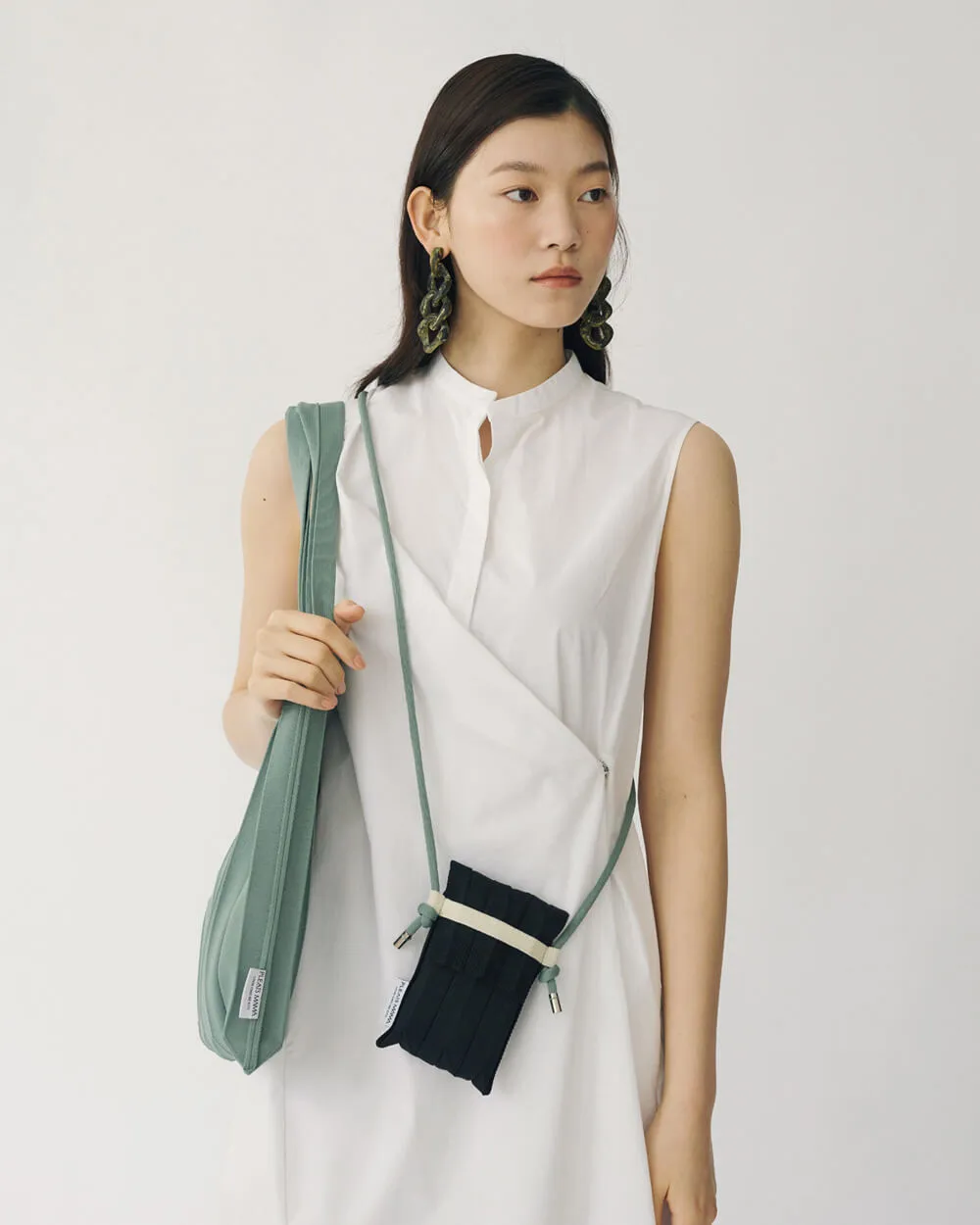 Knit Pleated Phone Bag made from Recycled Ocean Plastic - Tangerine