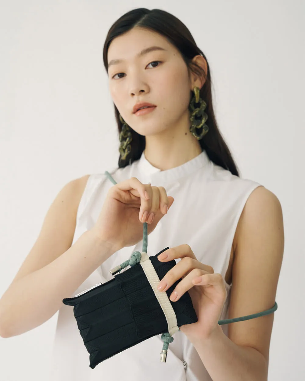 Knit Pleated Phone Bag made from Recycled Ocean Plastic - Tangerine